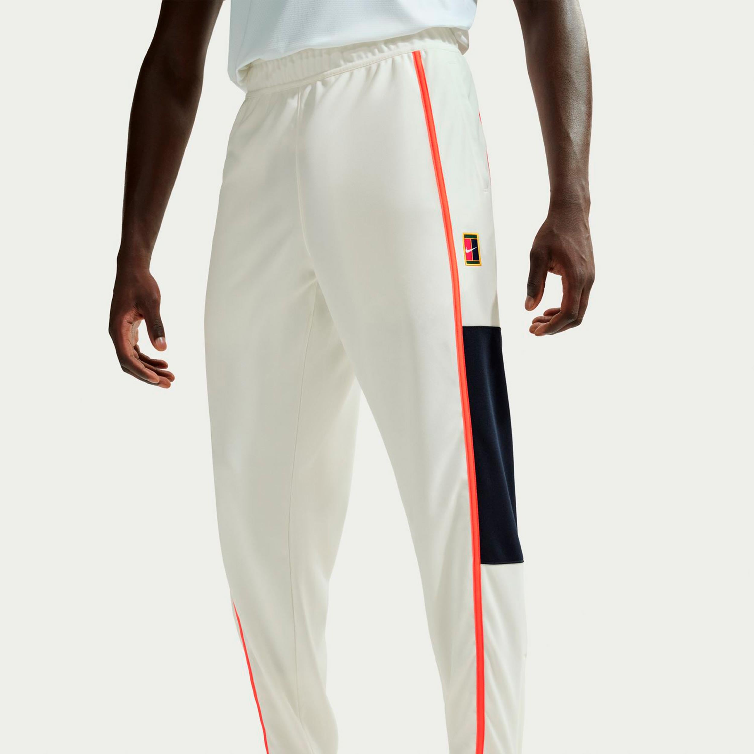 Nike Court Heritage Tréninkové kalhoty Muži-krémová, oranžová